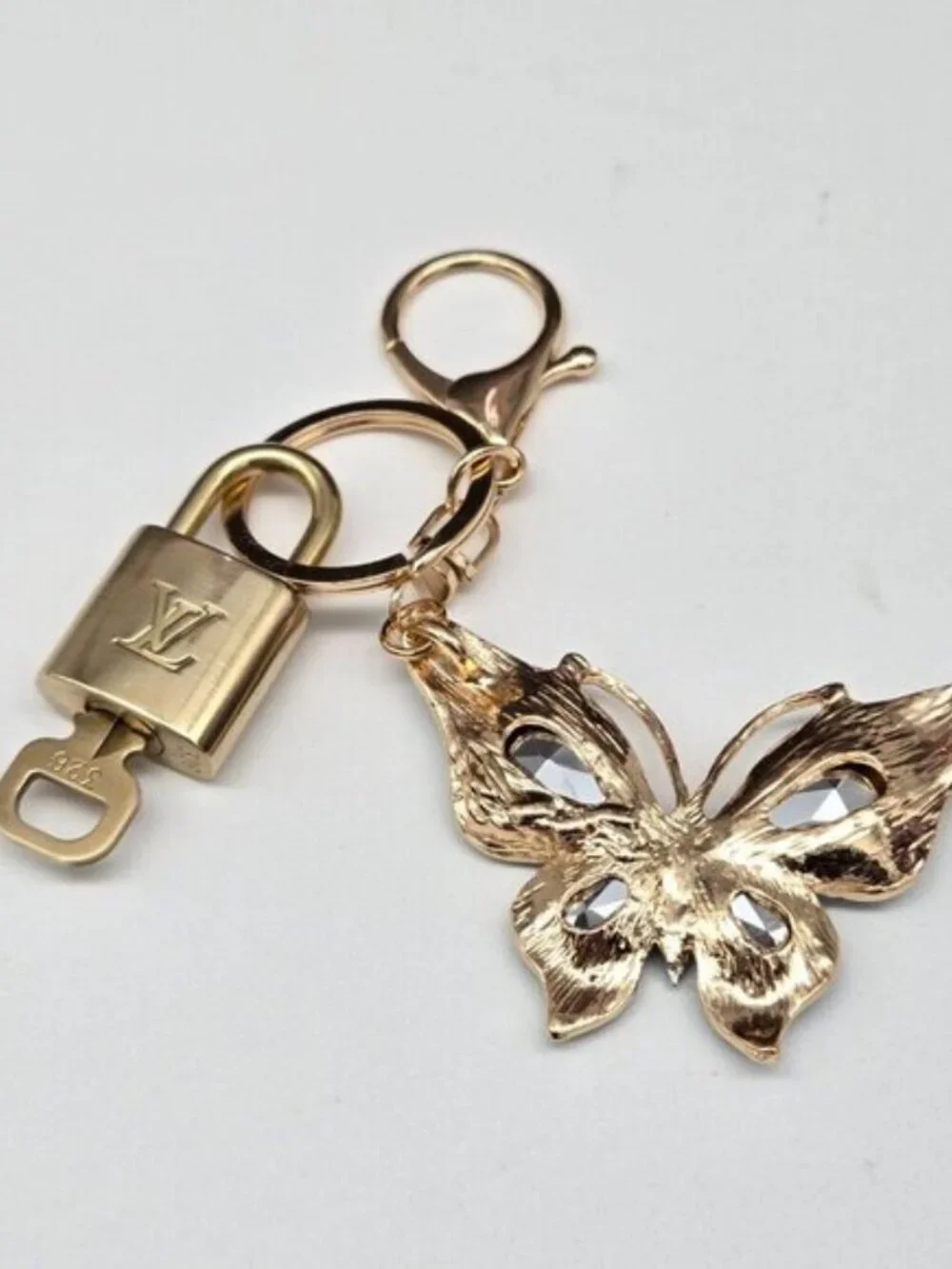 LV Authentic Gold Lock & Key 🔑 Luxury Bag Charm w/ Unbranded Butterfly Keychain